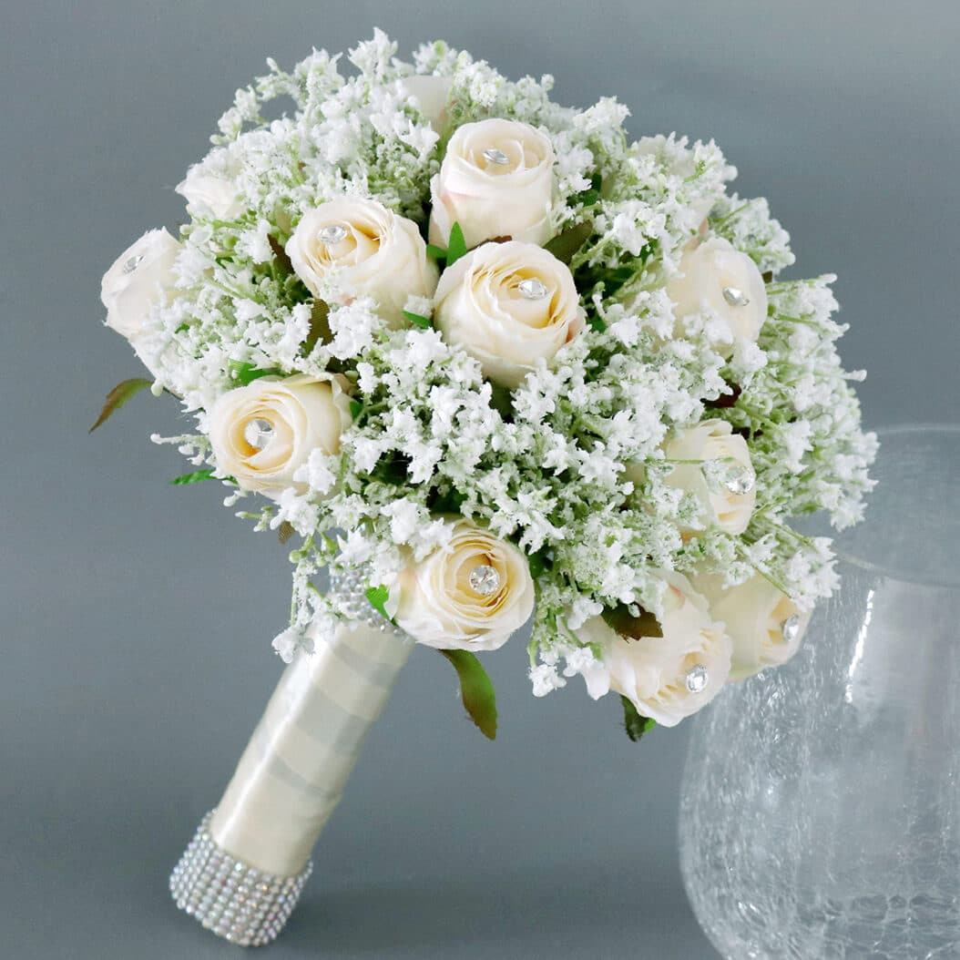 Bride's Hand Holding Artificial Wedding Bouquet Flower